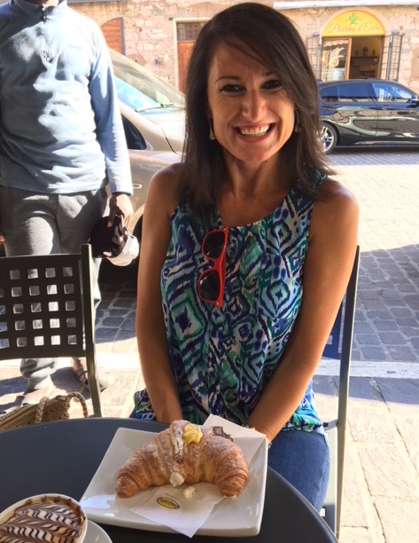 Leona at a cafe in Rome